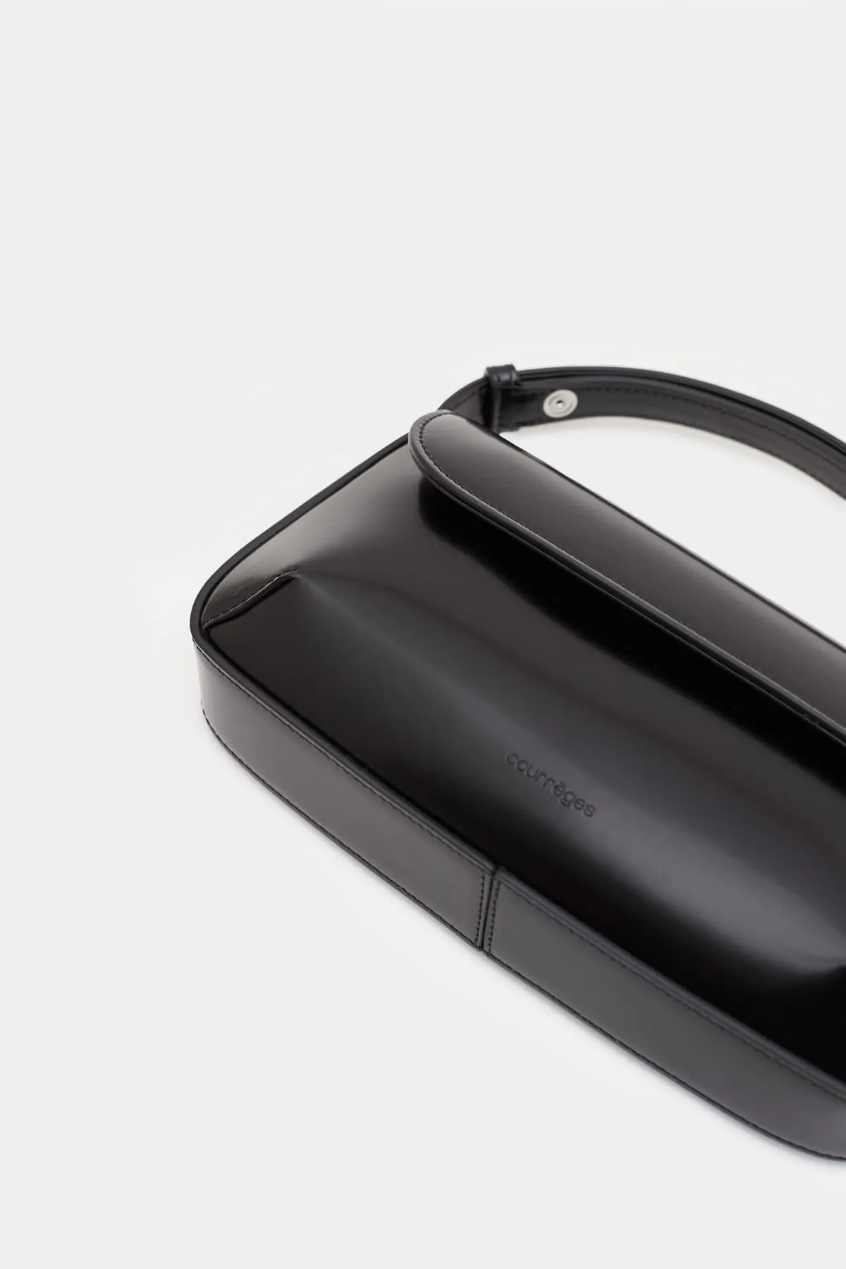 COURREGES BLACK SLEEK LEATHER BAG